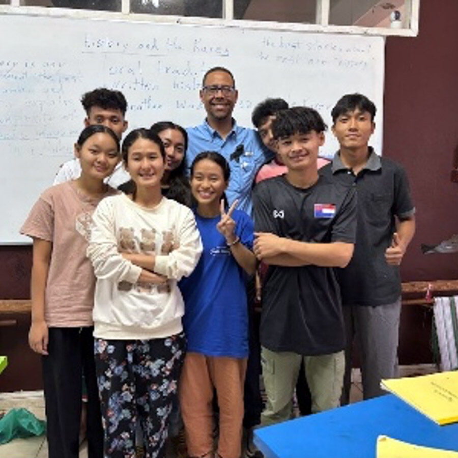 Paul Thompson with Victory Students